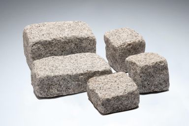 Five sizes of Granite Setts in light-grey-tumbled