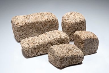 Five sizes of Granite Setts in golden-brown-tumbled